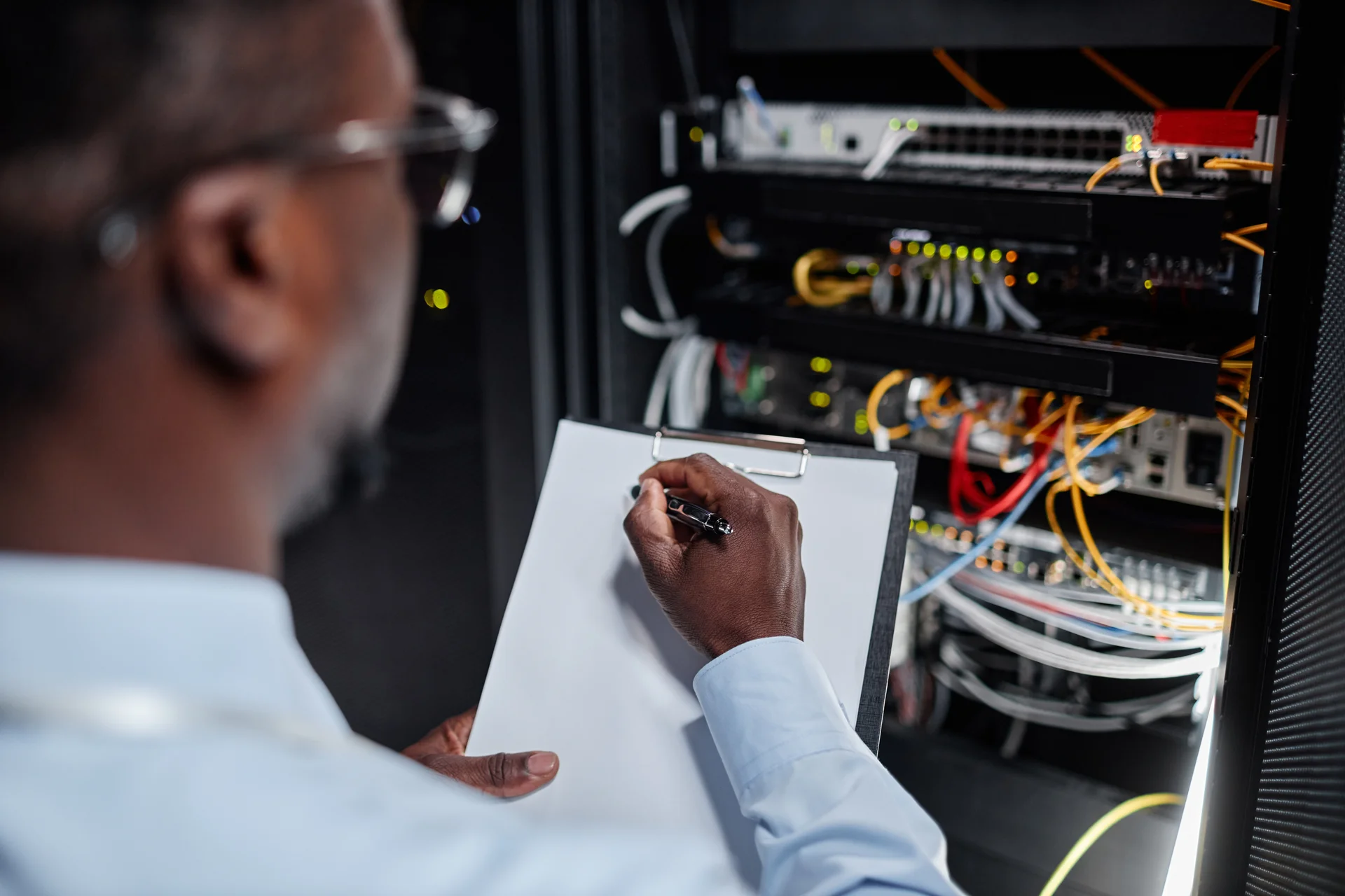 black-man-working-with-server-cabinet-in-data-cent-2026-03-19-23-15-04-utc.jpg